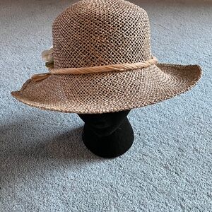 Elegant Tan Straw Hat with Floral Accent